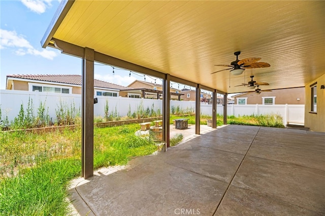 27555 Mountainside St, Menifee, CA 92584 - fenced backyard featuring a patio and a ceiling fan