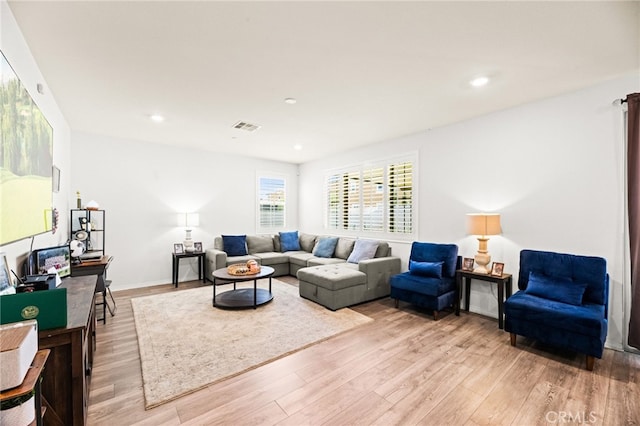 27555 Mountainside St, Menifee, CA 92584 - living area with light wood-style floors and recessed lighting