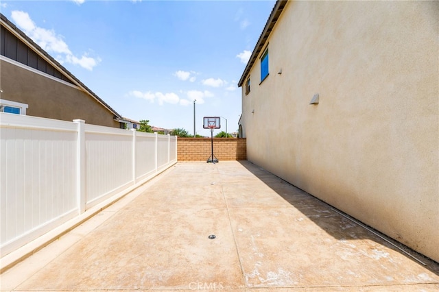 27555 Mountainside St, Menifee, CA 92584 - view of patio / terrace featuring basketball hoop