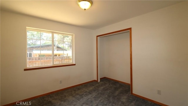 16141 Jessie St, Lower Lake, CA 95457 - empty room featuring baseboards and dark carpet