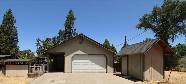 16141 Jessie St, Lower Lake, CA 95457 - view of front of house with an outbuilding, a garage, and concrete driveway