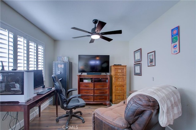 1320 Fairway Dr, Atwater, CA 95301 - home office with wood finished floors and a ceiling fan