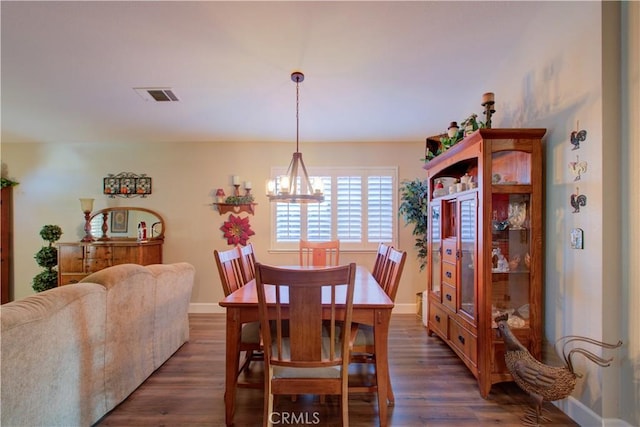 1320 Fairway Dr, Atwater, CA 95301 - dining room with dark wood-style floors and a chandelier