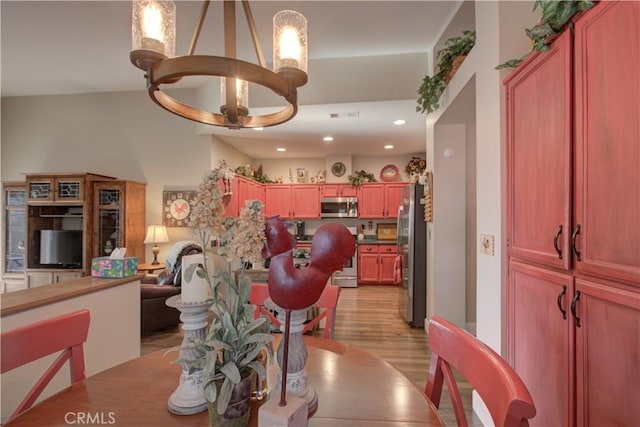 1320 Fairway Dr, Atwater, CA 95301 - dining room featuring light wood-style floors, a chandelier, and recessed lighting