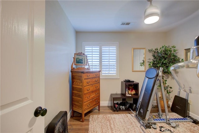 1320 Fairway Dr, Atwater, CA 95301 - workout area with wood finished floors and baseboards