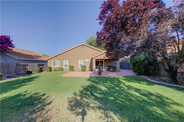 1320 Fairway Dr, Atwater, CA 95301 - rear view of property featuring a fenced backyard, a patio area, and stucco siding
