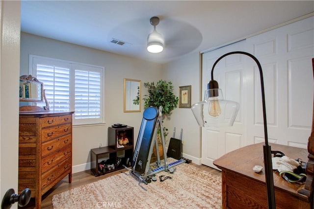 1320 Fairway Dr, Atwater, CA 95301 - workout area featuring a ceiling fan and wood finished floors