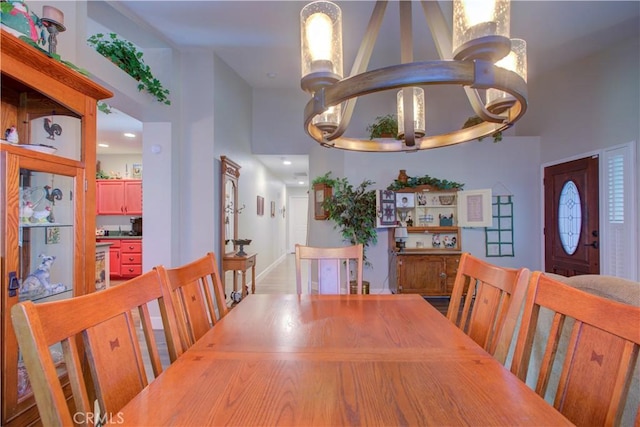 1320 Fairway Dr, Atwater, CA 95301 - dining area with a chandelier and a high ceiling