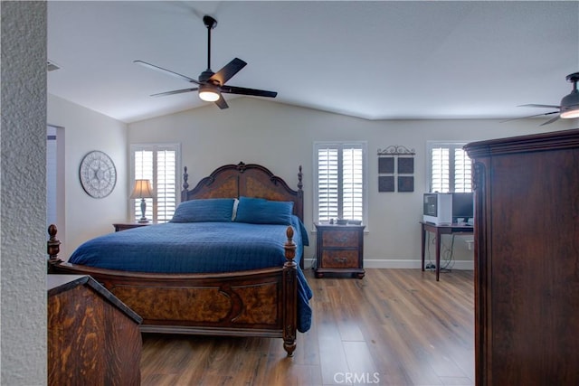 1320 Fairway Dr, Atwater, CA 95301 - bedroom featuring wood finished floors, lofted ceiling, and ceiling fan
