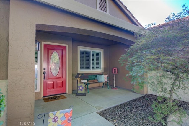 1320 Fairway Dr, Atwater, CA 95301 - view of exterior entry featuring stucco siding and covered porch
