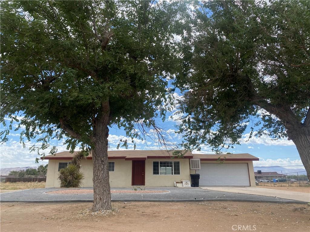 16161 Dale Evans, Apple Valley, CA 92307 - ranch-style house with stucco siding, concrete driveway, and a garage