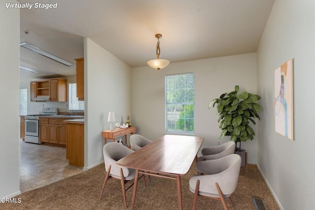 3629 Center St, Piru, CA 93040 - dining room with light colored carpet and baseboards