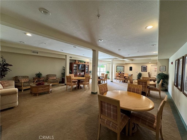 3120 Sepulveda Blvd Unit 409, Torrance, CA 90505 - dining room featuring carpet, a textured ceiling, and recessed lighting