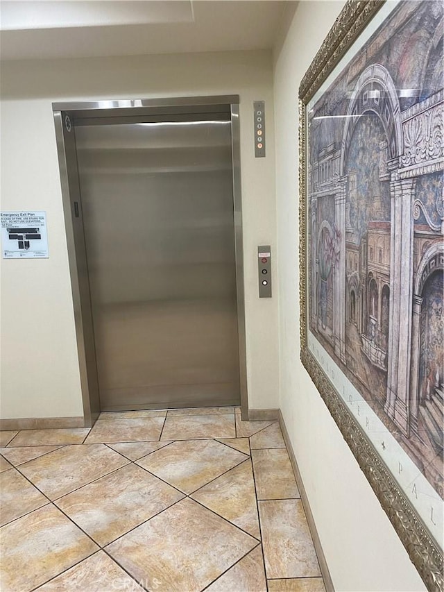 3120 Sepulveda Blvd Unit 409, Torrance, CA 90505 - corridor with elevator and tile patterned flooring