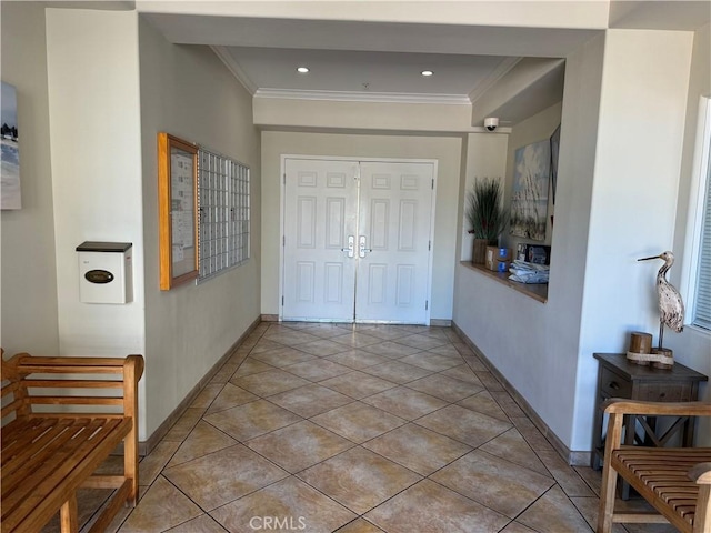 3120 Sepulveda Blvd Unit 409, Torrance, CA 90505 - entrance foyer with crown molding, tile patterned flooring, and recessed lighting