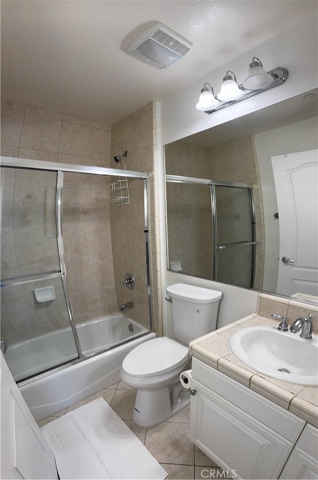 3120 Sepulveda Blvd Unit 409, Torrance, CA 90505 - full bath with vanity, shower / bath combination with glass door, and tile patterned floors