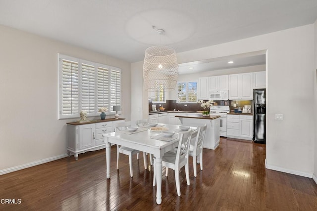 104 W Santa Clara St, Ventura, CA 93001 - dining room featuring dark wood-type flooring and recessed lighting
