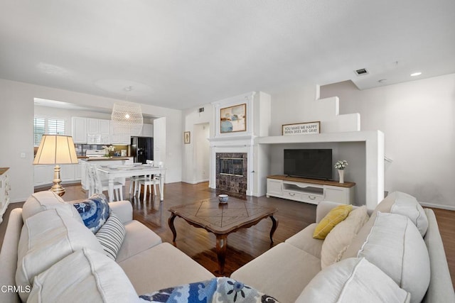 104 W Santa Clara St, Ventura, CA 93001 - living area featuring dark wood-style flooring, a fireplace, and recessed lighting