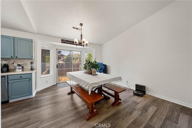 4742 Pauline Pl, Kelseyville, CA 95451 - dining space with a chandelier and dark wood-style floors