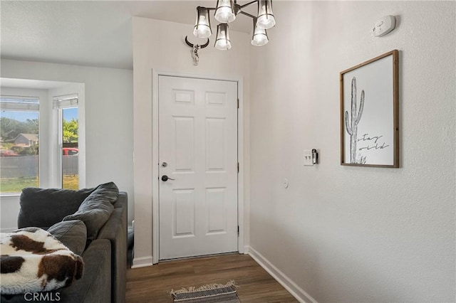 4742 Pauline Pl, Kelseyville, CA 95451 - entrance foyer with a chandelier and dark wood-style flooring