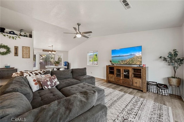 4742 Pauline Pl, Kelseyville, CA 95451 - living area featuring a ceiling fan, lofted ceiling, a chandelier, and light wood finished floors