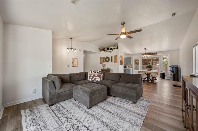 4742 Pauline Pl, Kelseyville, CA 95451 - living area featuring a chandelier, lofted ceiling, wood finished floors, and ceiling fan