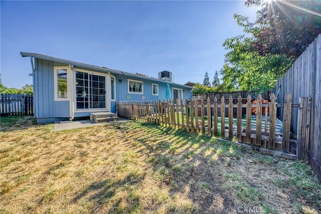 4742 Pauline Pl, Kelseyville, CA 95451 - back of property featuring a fenced backyard and board and batten siding
