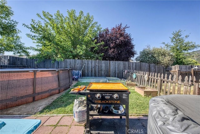 4742 Pauline Pl, Kelseyville, CA 95451 - fenced backyard with a vegetable garden