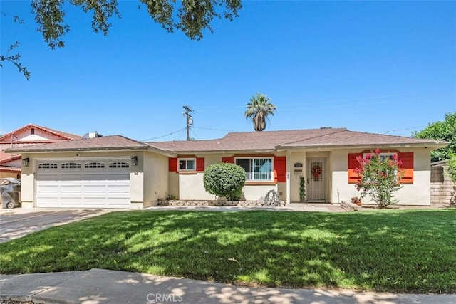 5228 N G St, San Bernardino, CA 92407 - ranch-style house with stucco siding, a garage, a front lawn, and concrete driveway