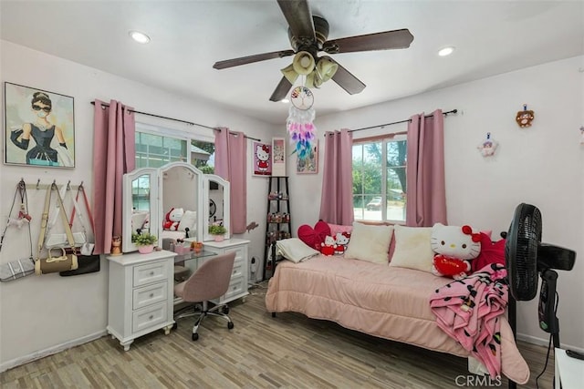 5228 N G St, San Bernardino, CA 92407 - bedroom with multiple windows, light wood-style floors, recessed lighting, an office area, and a ceiling fan