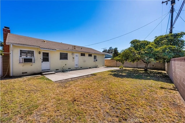 473 W Roberta Ave, Fullerton, CA 92832 - rear view of house featuring a fenced backyard, a patio area, cooling unit, and a chimney