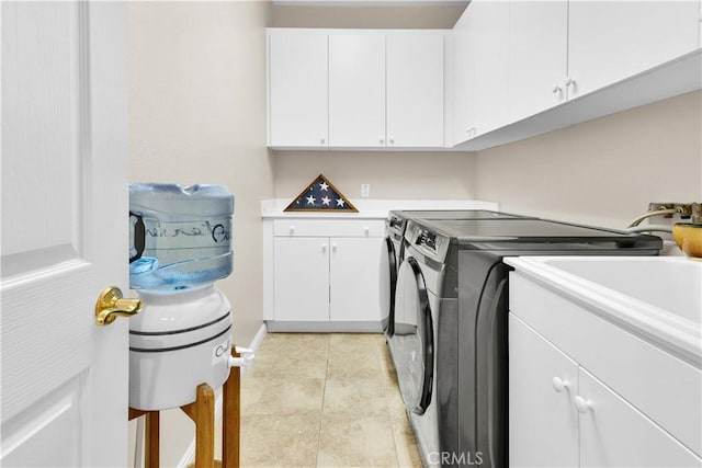 2757 Traditions, Paso Robles, CA 93446 - laundry room with cabinet space, washing machine and dryer, and light tile patterned floors