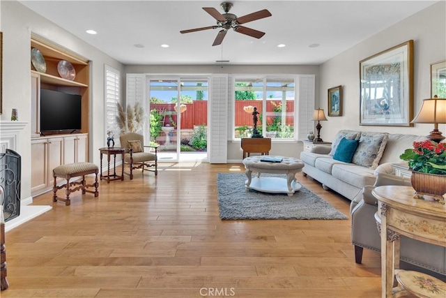 2757 Traditions, Paso Robles, CA 93446 - living area featuring ceiling fan, light wood finished floors, and recessed lighting