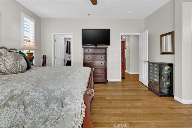2757 Traditions, Paso Robles, CA 93446 - bedroom with light wood-style floors, a spacious closet, and ceiling fan