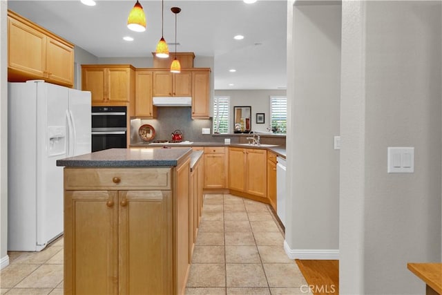 2757 Traditions, Paso Robles, CA 93446 - kitchen featuring white fridge with ice dispenser, stainless steel double oven, a kitchen island, under cabinet range hood, and light brown cabinetry