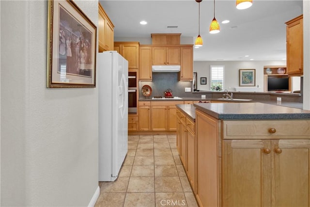 2757 Traditions, Paso Robles, CA 93446 - kitchen with white fridge with ice dispenser, under cabinet range hood, cooktop, pendant lighting, and decorative backsplash