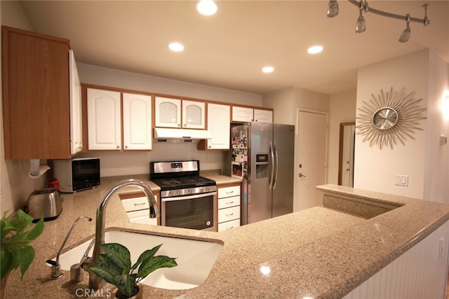800 Via Colinas, Westlake Village, CA 91362 - kitchen featuring stainless steel appliances, under cabinet range hood, light stone countertops, white cabinetry, and recessed lighting
