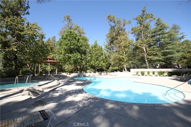 800 Via Colinas, Westlake Village, CA 91362 - community pool with a patio and view of wooded area