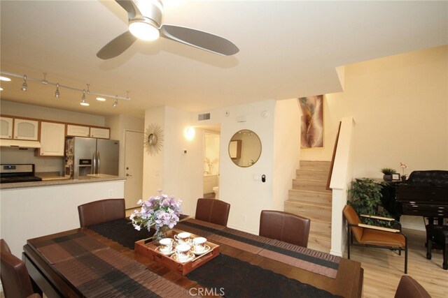 800 Via Colinas, Westlake Village, CA 91362 - dining room featuring stairs, light wood-style floors, and ceiling fan