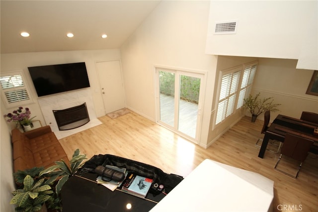 800 Via Colinas, Westlake Village, CA 91362 - living room featuring wood finished floors, recessed lighting, a high end fireplace, and high vaulted ceiling