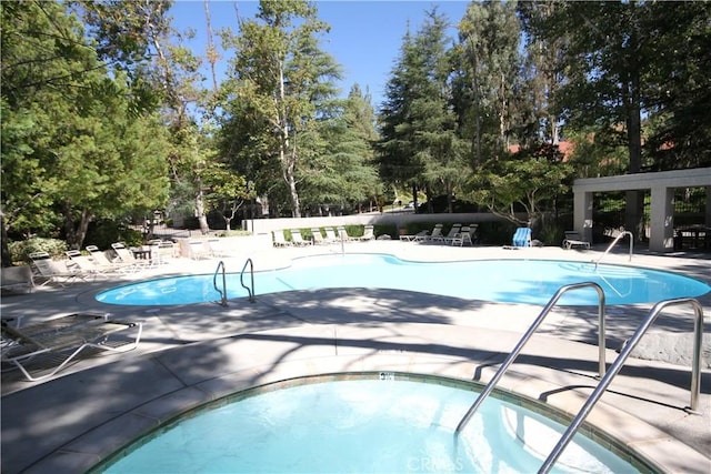 800 Via Colinas, Westlake Village, CA 91362 - community pool featuring a patio area and view of wooded area