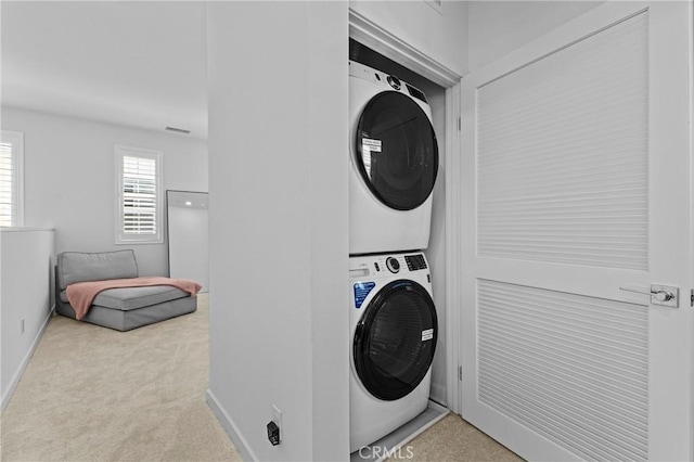 4408 S Grant Paseo, Ontario, CA 91762 - washroom with stacked washer / dryer and carpet flooring