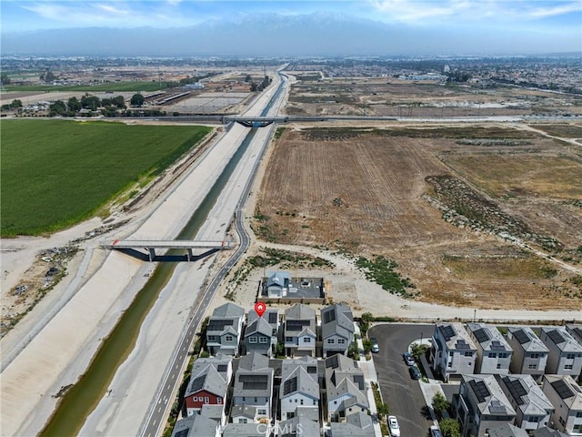 4408 S Grant Paseo, Ontario, CA 91762 - aerial view of property and surrounding area featuring nearby suburban area