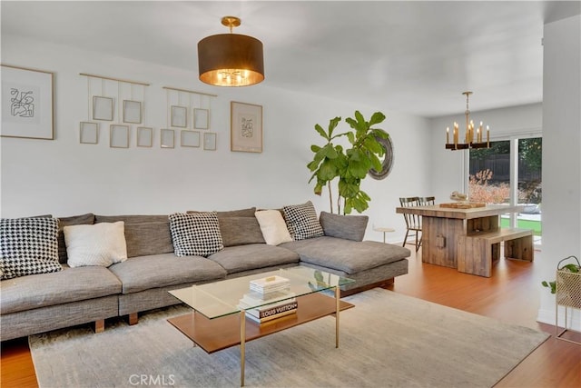 406 Eucalyptus Dr, Redlands, CA 92373 - living area with a chandelier and wood finished floors
