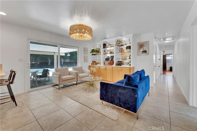 406 Eucalyptus Dr, Redlands, CA 92373 - living area featuring light tile patterned floors and a chandelier
