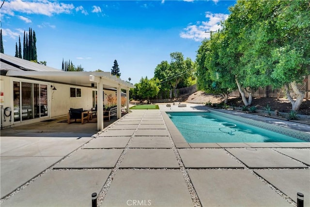 406 Eucalyptus Dr, Redlands, CA 92373 - view of swimming pool featuring a patio area and a fenced backyard