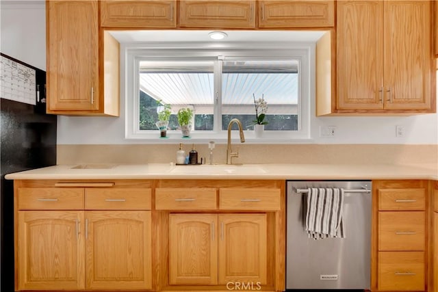 406 Eucalyptus Dr, Redlands, CA 92373 - kitchen featuring stainless steel dishwasher, plenty of natural light, light countertops, and light brown cabinets
