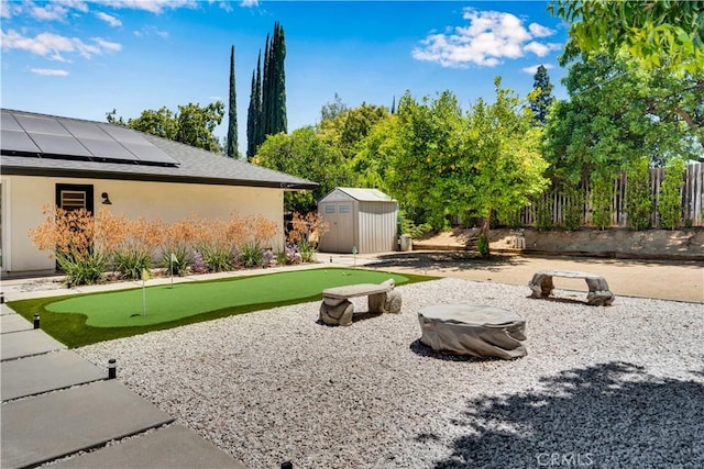 406 Eucalyptus Dr, Redlands, CA 92373 - view of yard with a putting area and a shed