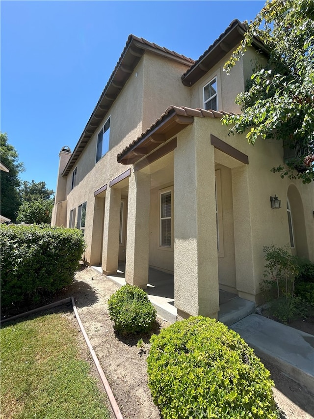 39877 Worthington Pl, Temecula, CA 92591 - view of property exterior with stucco siding and a tiled roof