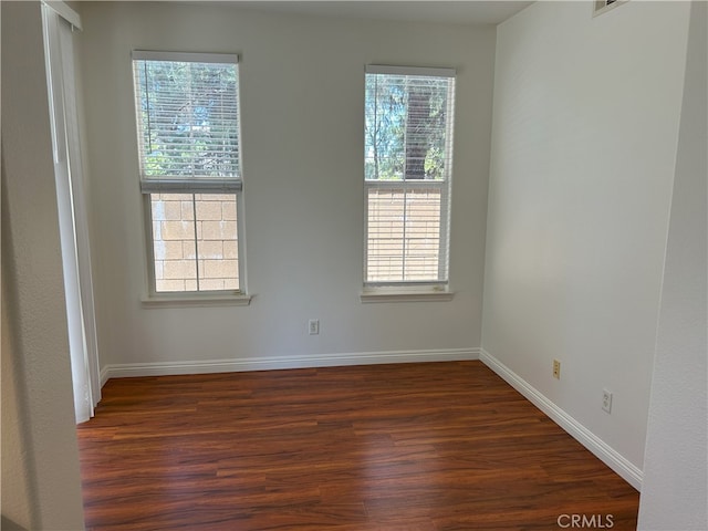 39877 Worthington Pl, Temecula, CA 92591 - unfurnished room with dark wood-style floors and plenty of natural light